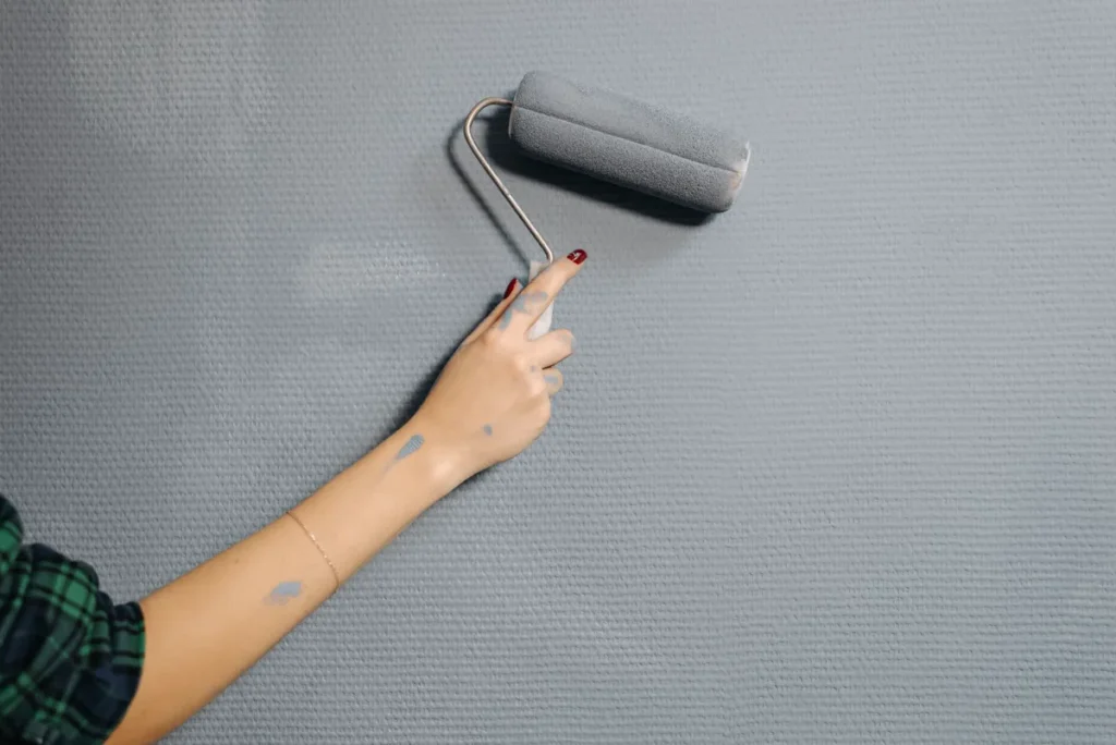 House painter in Multan painting an interior wall