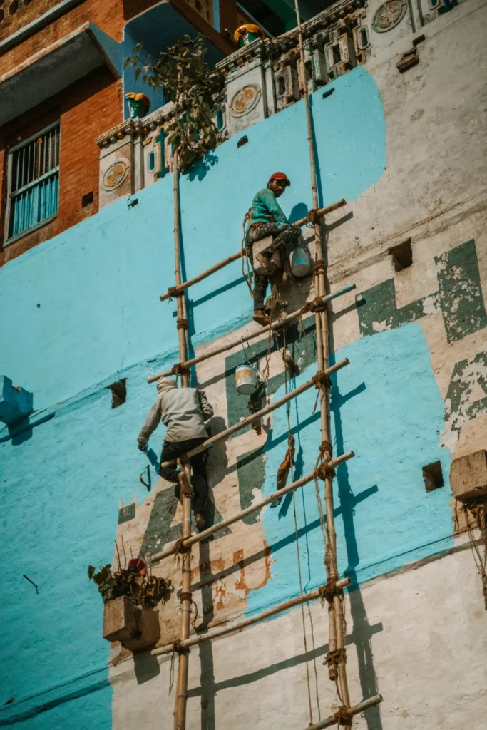 painter services House painter in Multan painting an exterior building wall