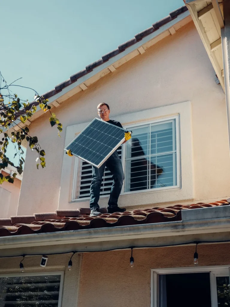 Solar technician on a rooftop in Multan